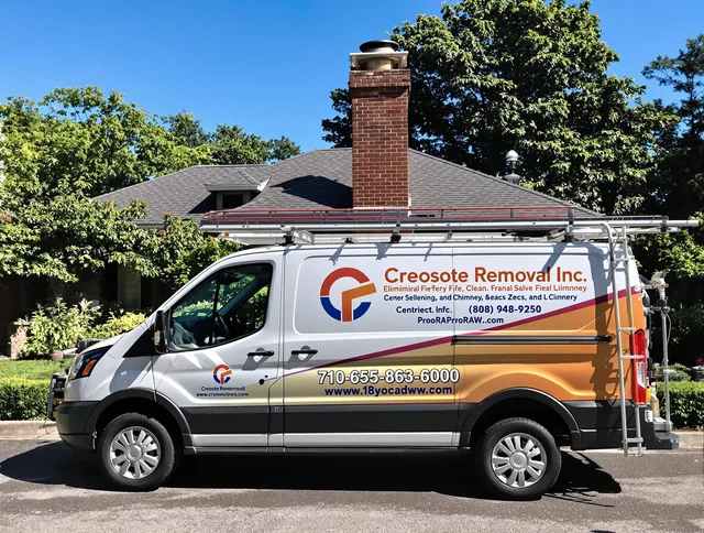 Bristol Chimney Sweep technician removing creosote safely in Bristol, RI